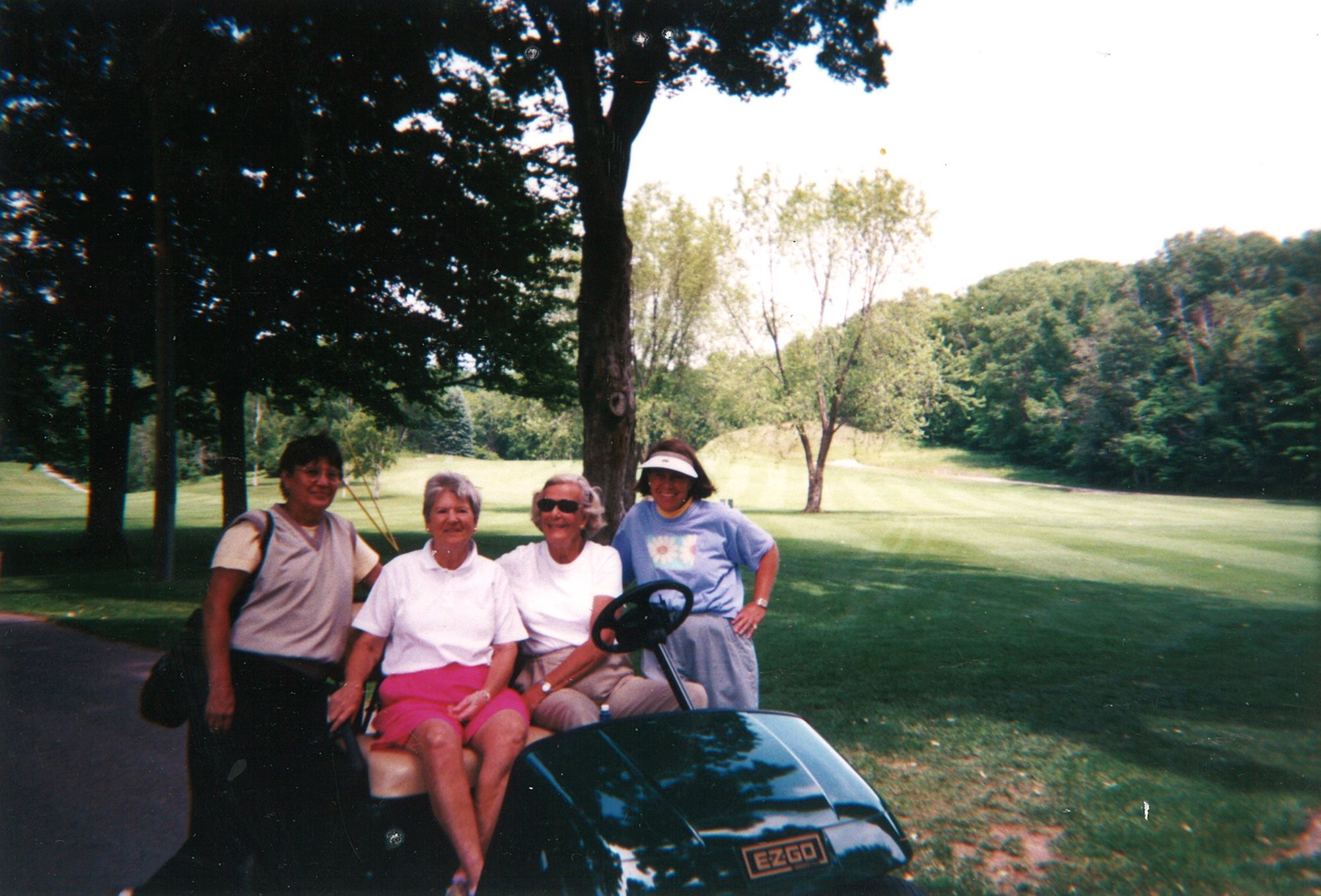 ladies golf foursome on cart 2001